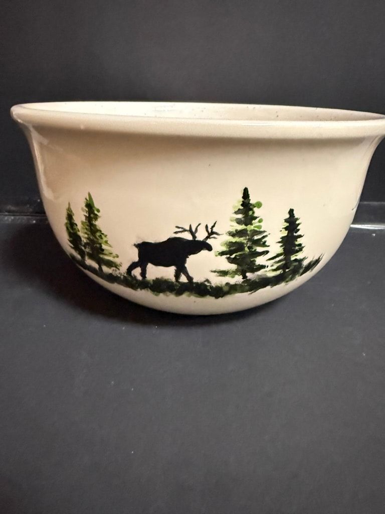 Hand-painted ceramic bowl with moose and forest design — a piece from Next of Kiln, LLC